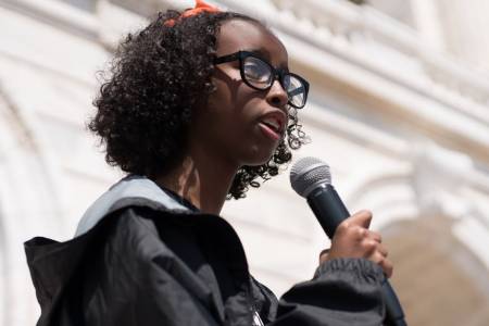 Isra Hirsi in a movement 